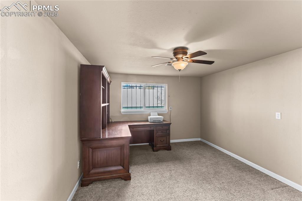 526 Griffith Way Colorado Springs, CO 80911 - Photo 32 of 46 a dining room with furniture and window