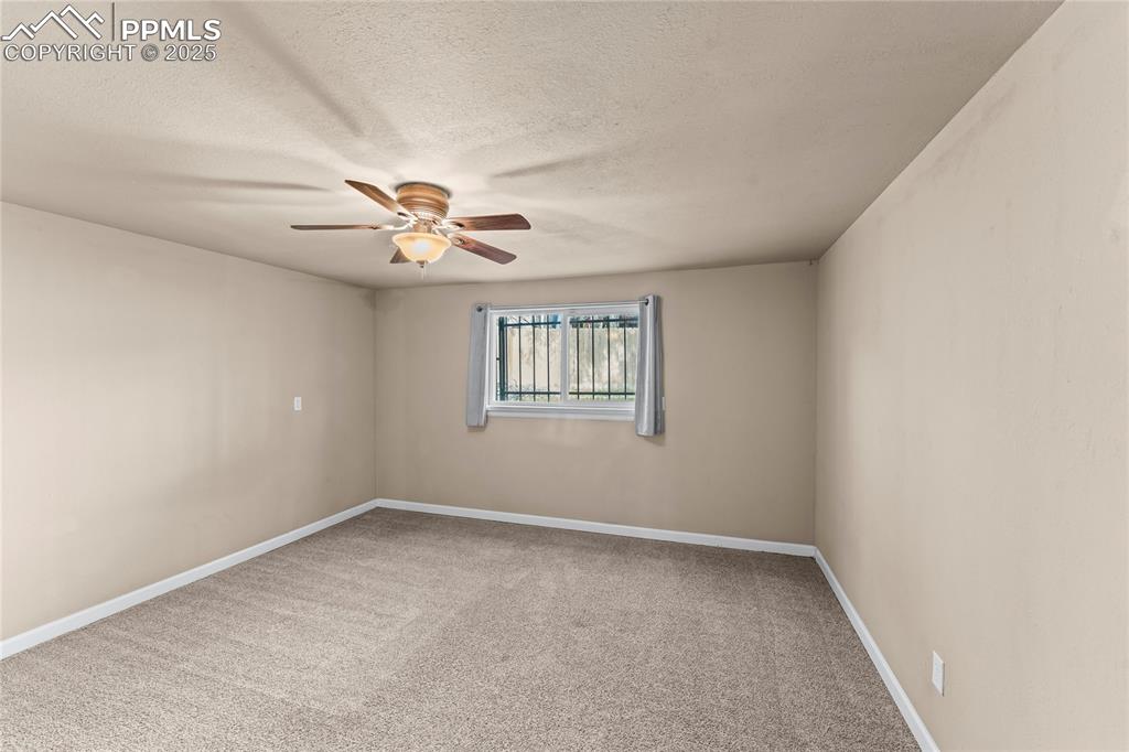 526 Griffith Way Colorado Springs, CO 80911 - Photo 34 of 46 wooden floor in an empty room
