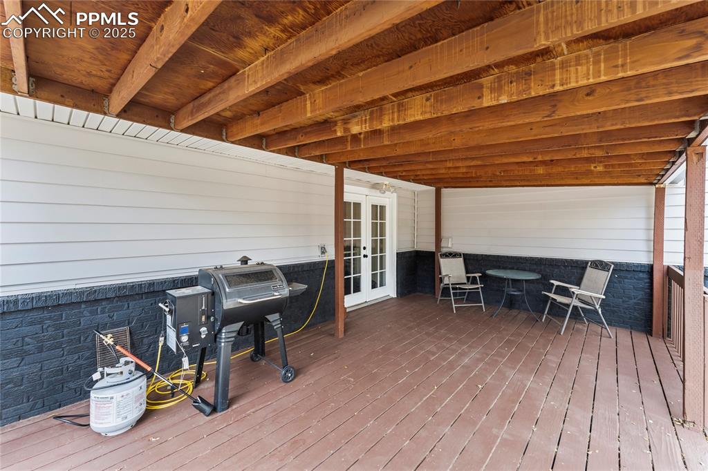 526 Griffith Way Colorado Springs, CO 80911 - Photo 37 of 46 a view of a patio with table and chairs