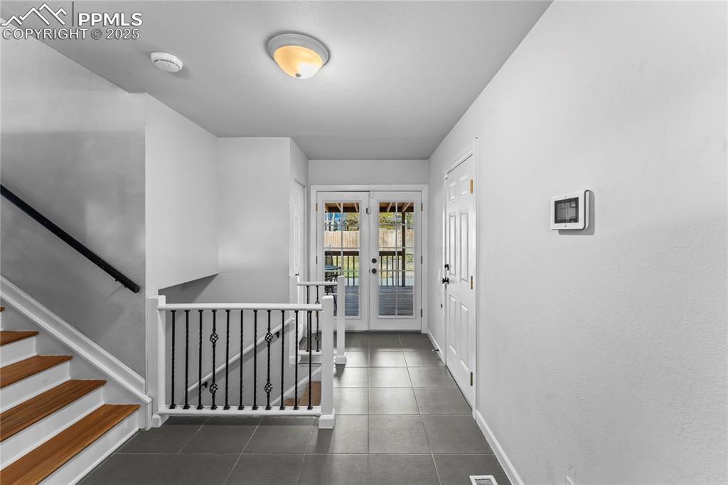 526 Griffith Way Colorado Springs, CO 80911 - Photo 7 of 46 a view of a hallway with windows