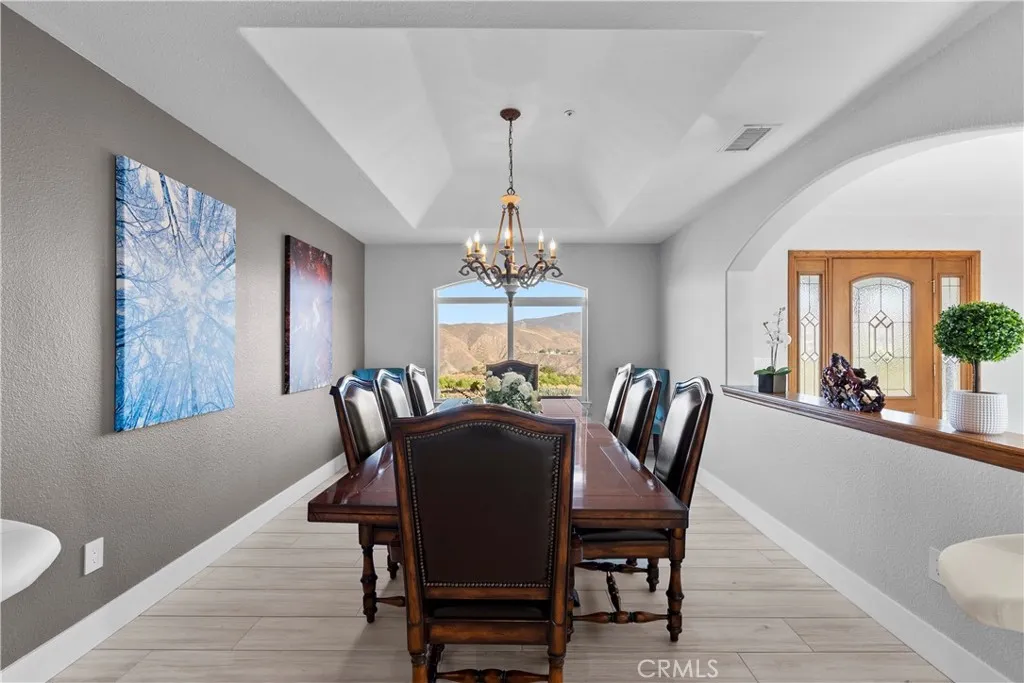 31800 Diamond View Lane Agua Dulce, CA 91390 - Photo 11 of 36 a view of a dining room with furniture window and wooden floor