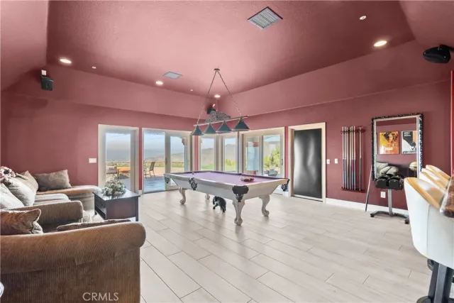 a living room with furniture and window