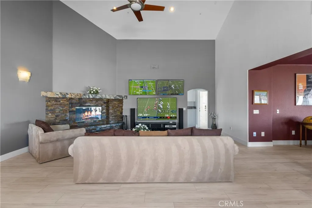 31800 Diamond View Lane Agua Dulce, CA 91390 - Photo 24 of 36 a living room with furniture and a fireplace