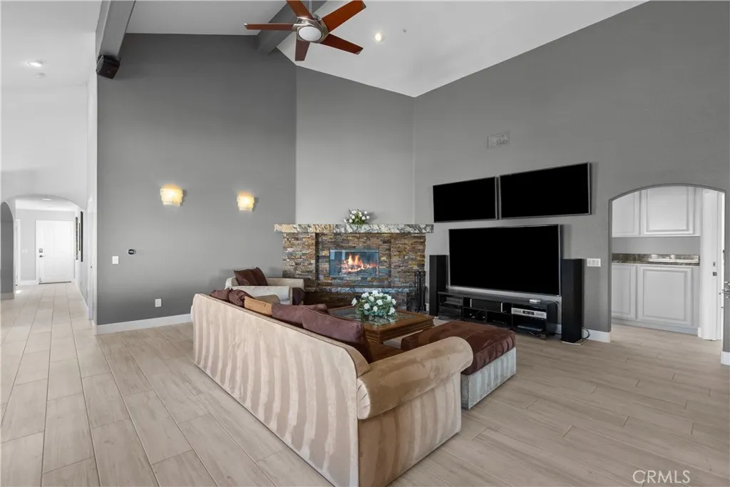 31800 Diamond View Lane Agua Dulce, CA 91390 - Photo 27 of 36 a living room with furniture and a flat screen tv