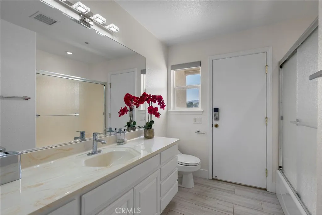 31800 Diamond View Lane Agua Dulce, CA 91390 - Photo 28 of 36 a bathroom with a sink vanity granite and a toilet