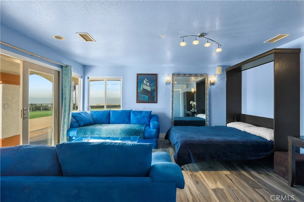 31800 Diamond View Lane Agua Dulce, CA 91390 - Photo 30 of 36 a living room with a couch and a view of kitchen