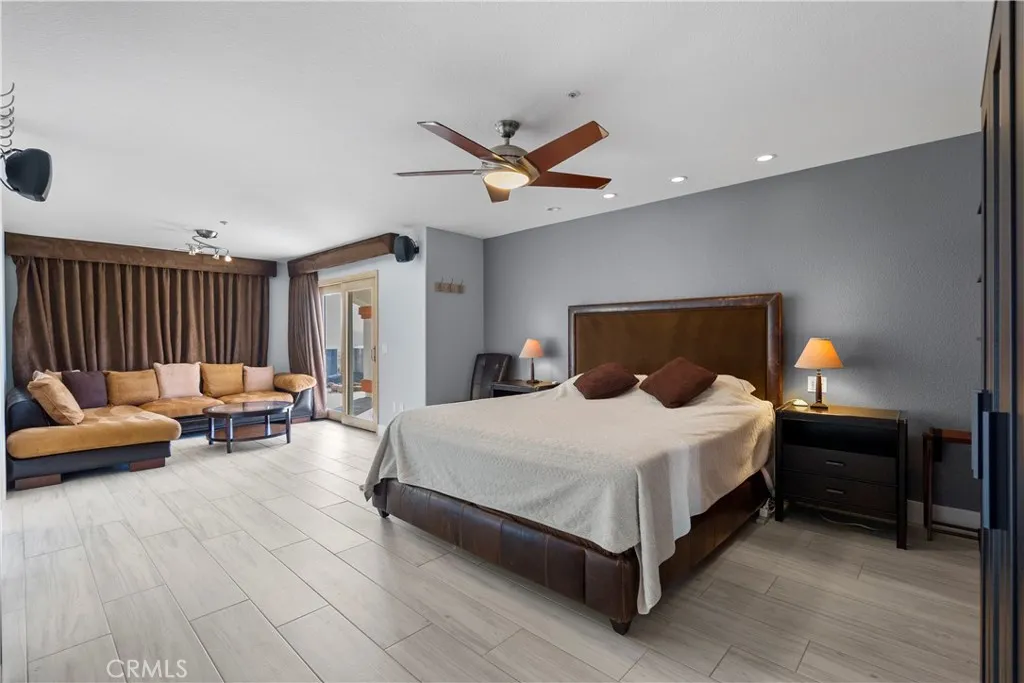 31800 Diamond View Lane Agua Dulce, CA 91390 - Photo 31 of 36 a spacious bedroom with a bed and a couch