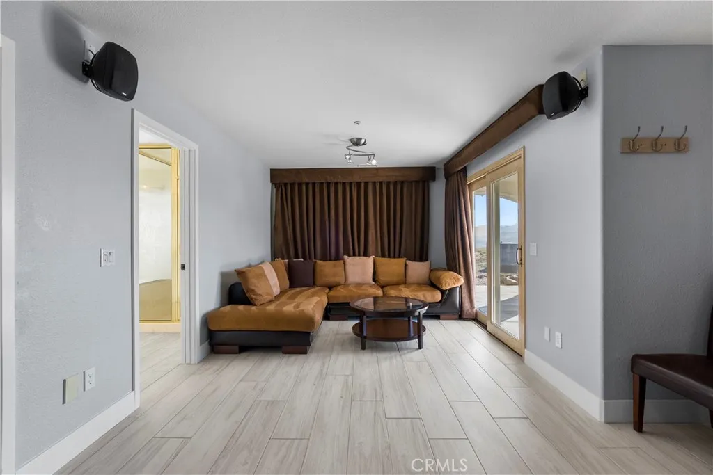 31800 Diamond View Lane Agua Dulce, CA 91390 - Photo 32 of 36 a living room with furniture and a window