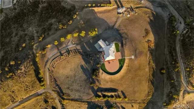 a view of a patio with fire pit