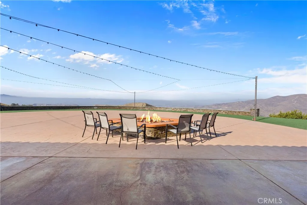 31800 Diamond View Lane Agua Dulce, CA 91390 - Photo 7 of 36 a view of a patio with fire pit