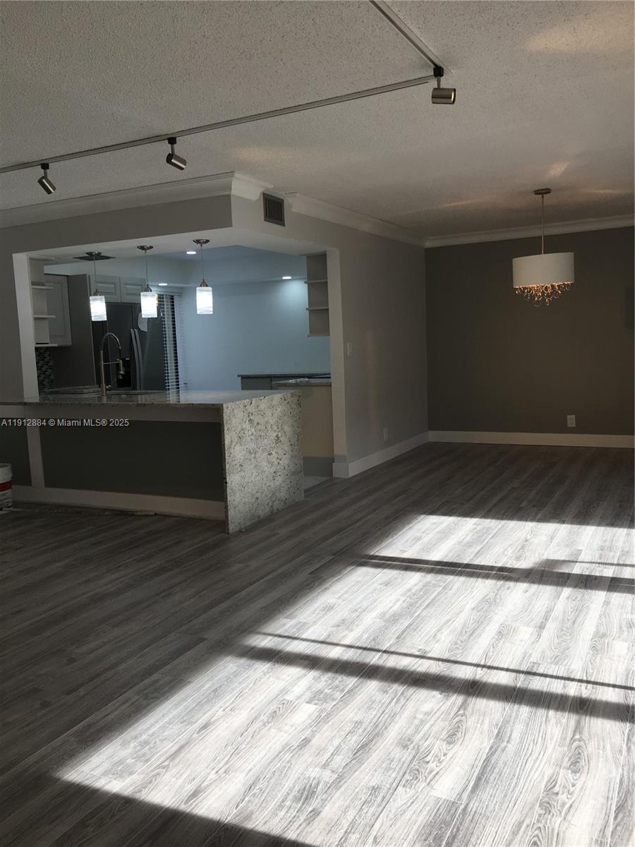Boca del Mar Boca Raton, FL 33433 - Photo 2 of 6 a view of a hallway with wooden floor