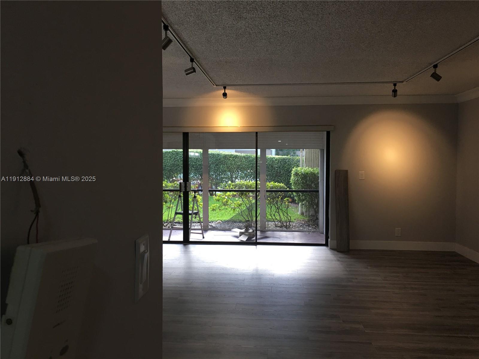 Boca del Mar Boca Raton, FL 33433 - Photo 6 of 6 a view of empty room with wooden floor and fan