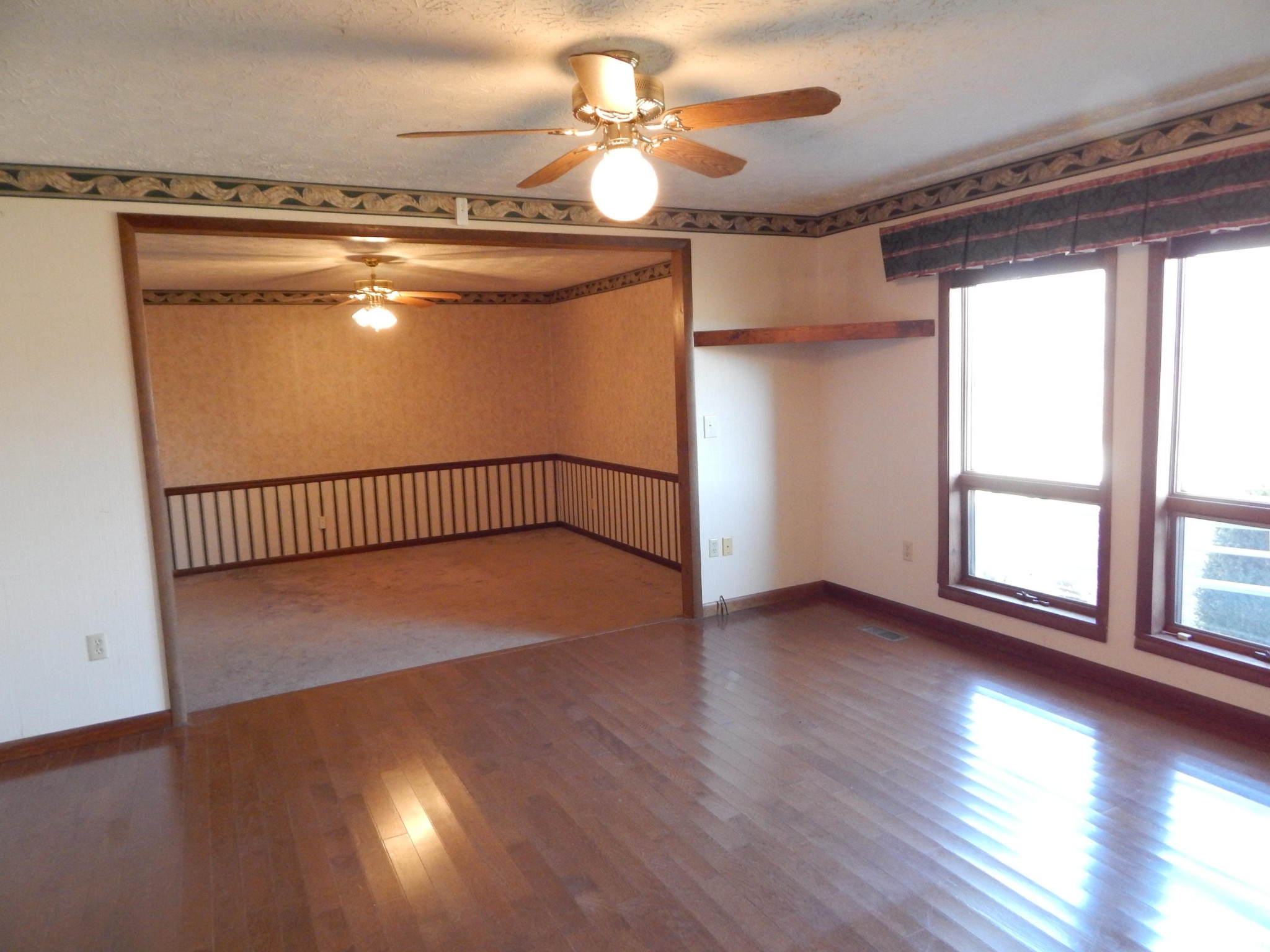 310 Houston Road Crossville, TN 38555 - Photo 18 of 40 a view of an empty room with wooden floor and a window