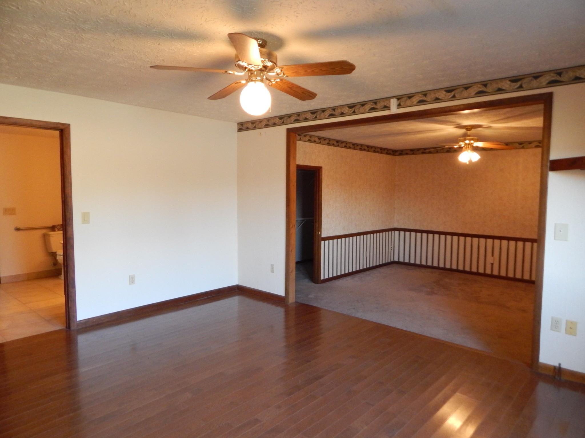 310 Houston Road Crossville, TN 38555 - Photo 19 of 40 a view of an empty room with wooden floor