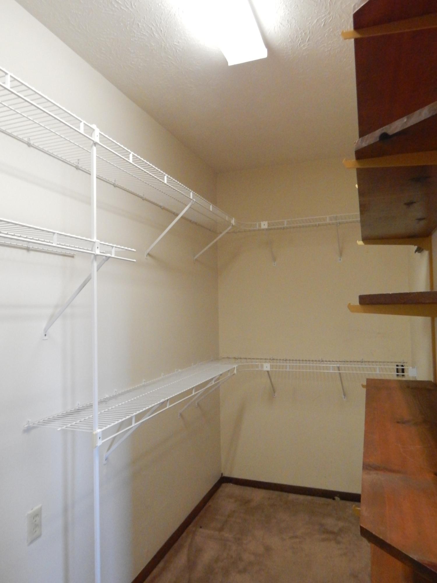 310 Houston Road Crossville, TN 38555 - Photo 20 of 40 a view of storage and utility room with empty racks