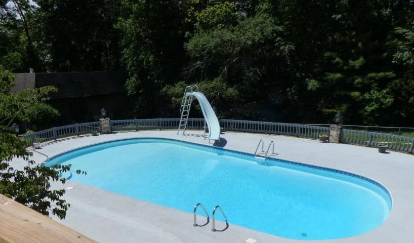 310 Houston Road Crossville, TN 38555 - Photo 3 of 40 a view of a swimming pool with a patio and plants