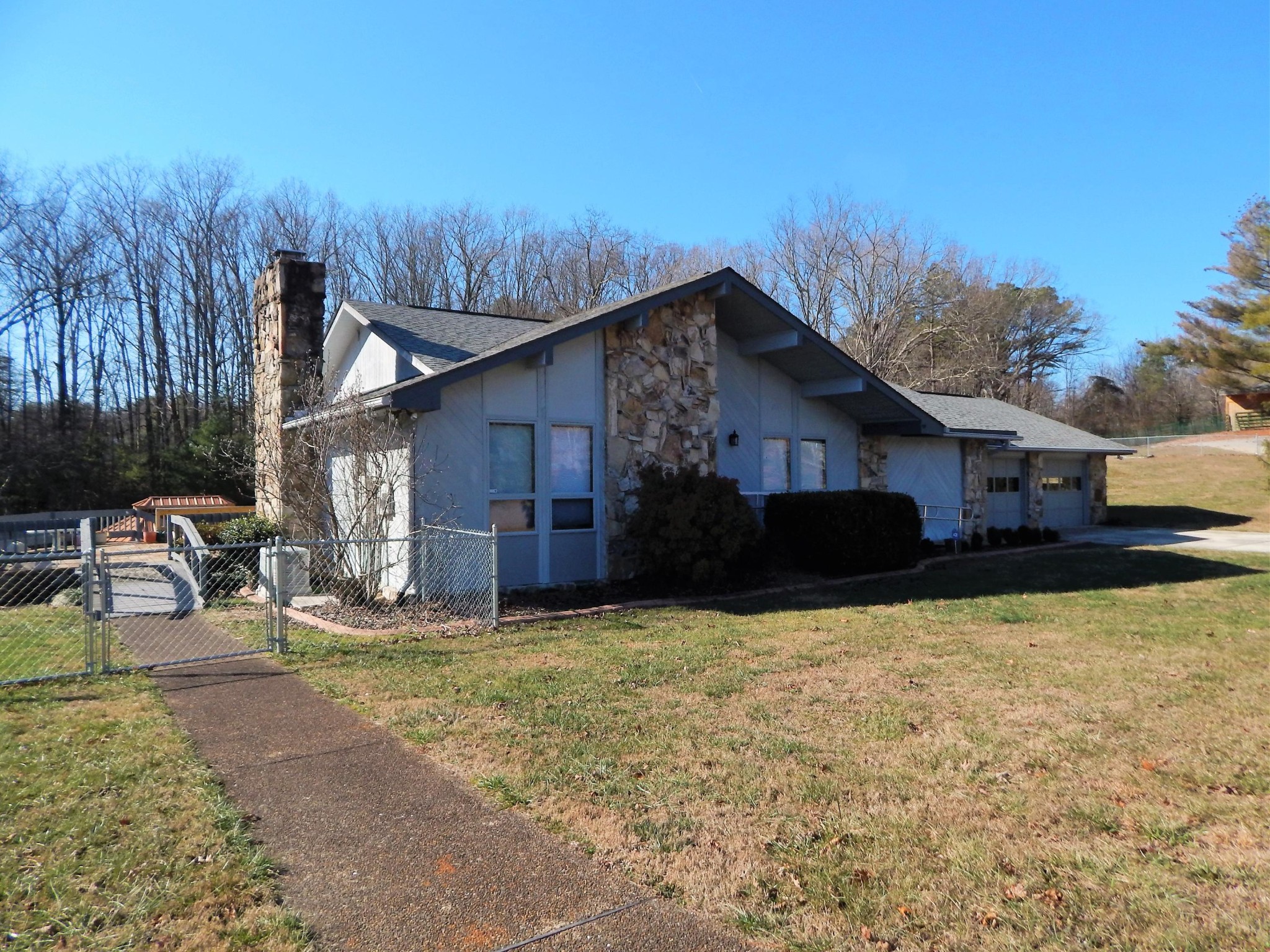 310 Houston Road Crossville, TN 38555 - Photo 5 of 40 a view of a house with patio