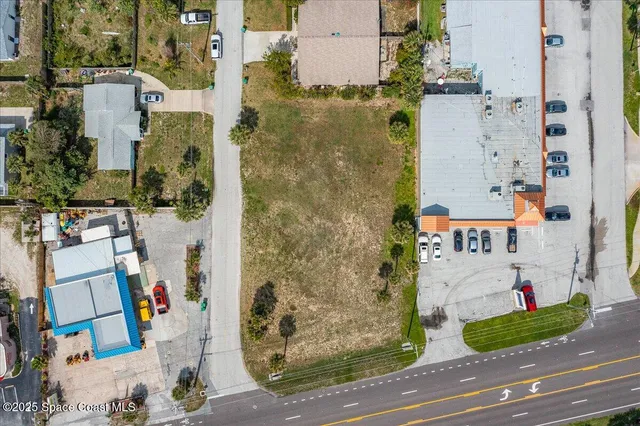 aerial view of residential houses with outdoor space