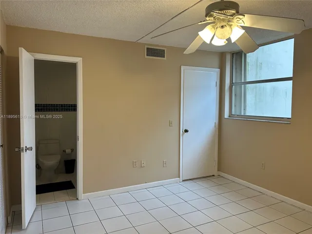 a view of a small space with racks on the wall