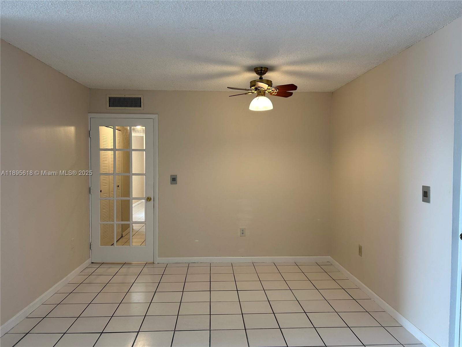 9411 Southwest 4th Street, Unit 202 Miami, FL 33174 - Photo 7 of 20 a view of an empty room