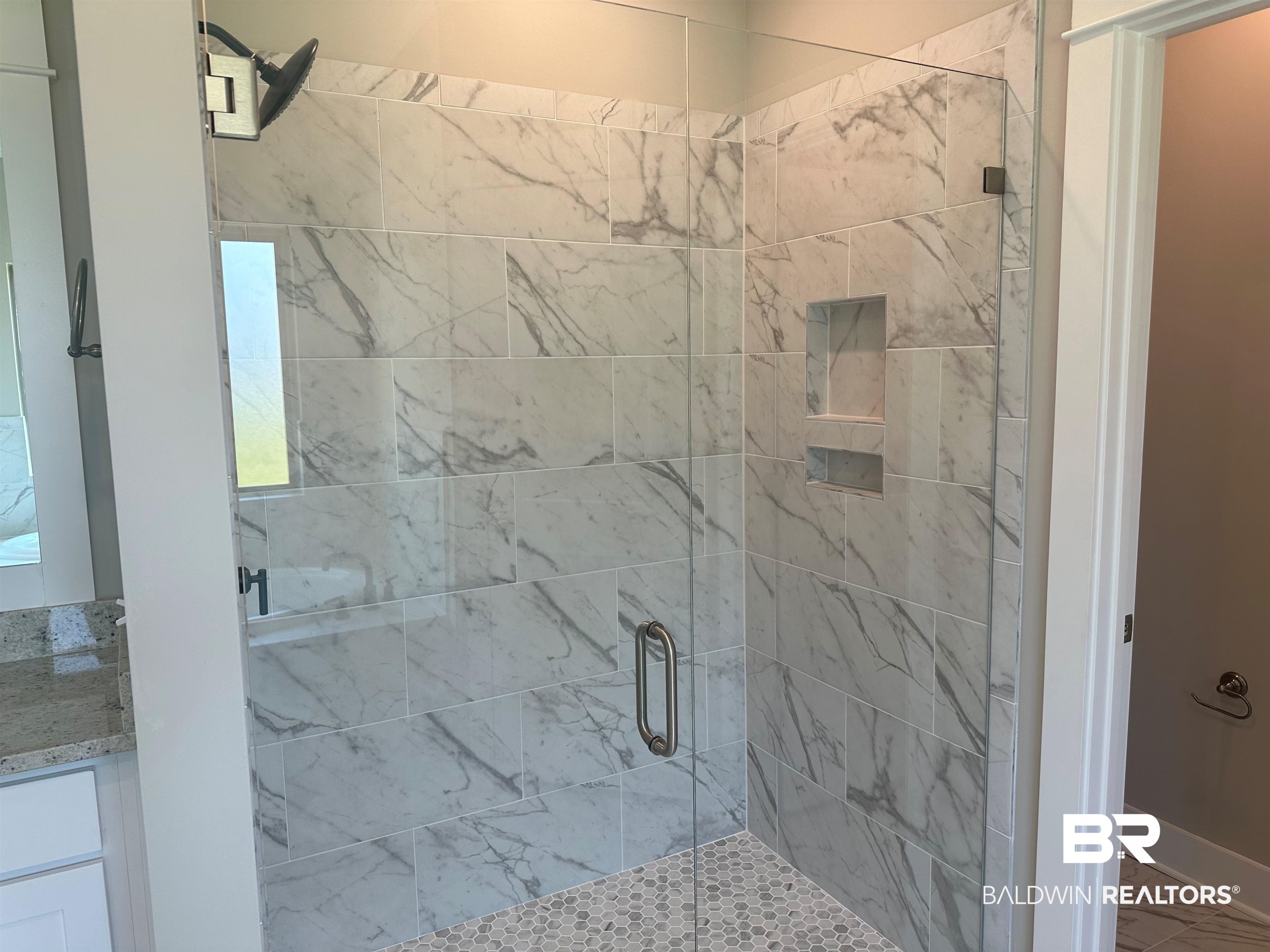 23548 Travis Stock Street, Unit 50 Foley, AL 36535 - Photo 21 of 30 Primary bathroom tile shower