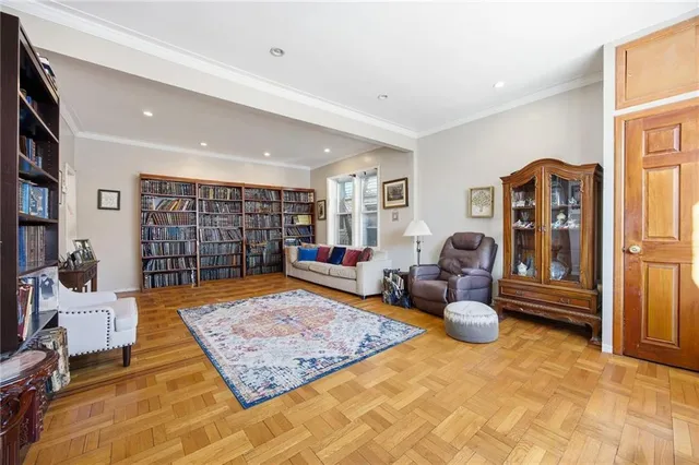 a living room with furniture and a rug