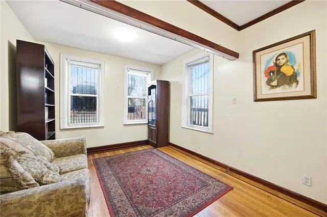 a living room with furniture and window