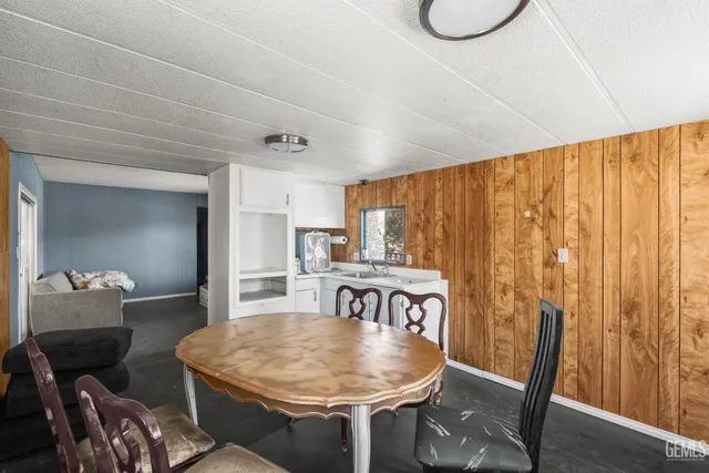 a bathroom with a sink and a large mirror