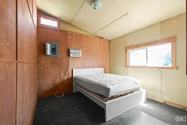 a view of hallway with wooden floor