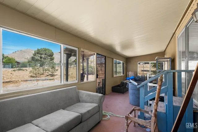 a pathway of a house with a yard