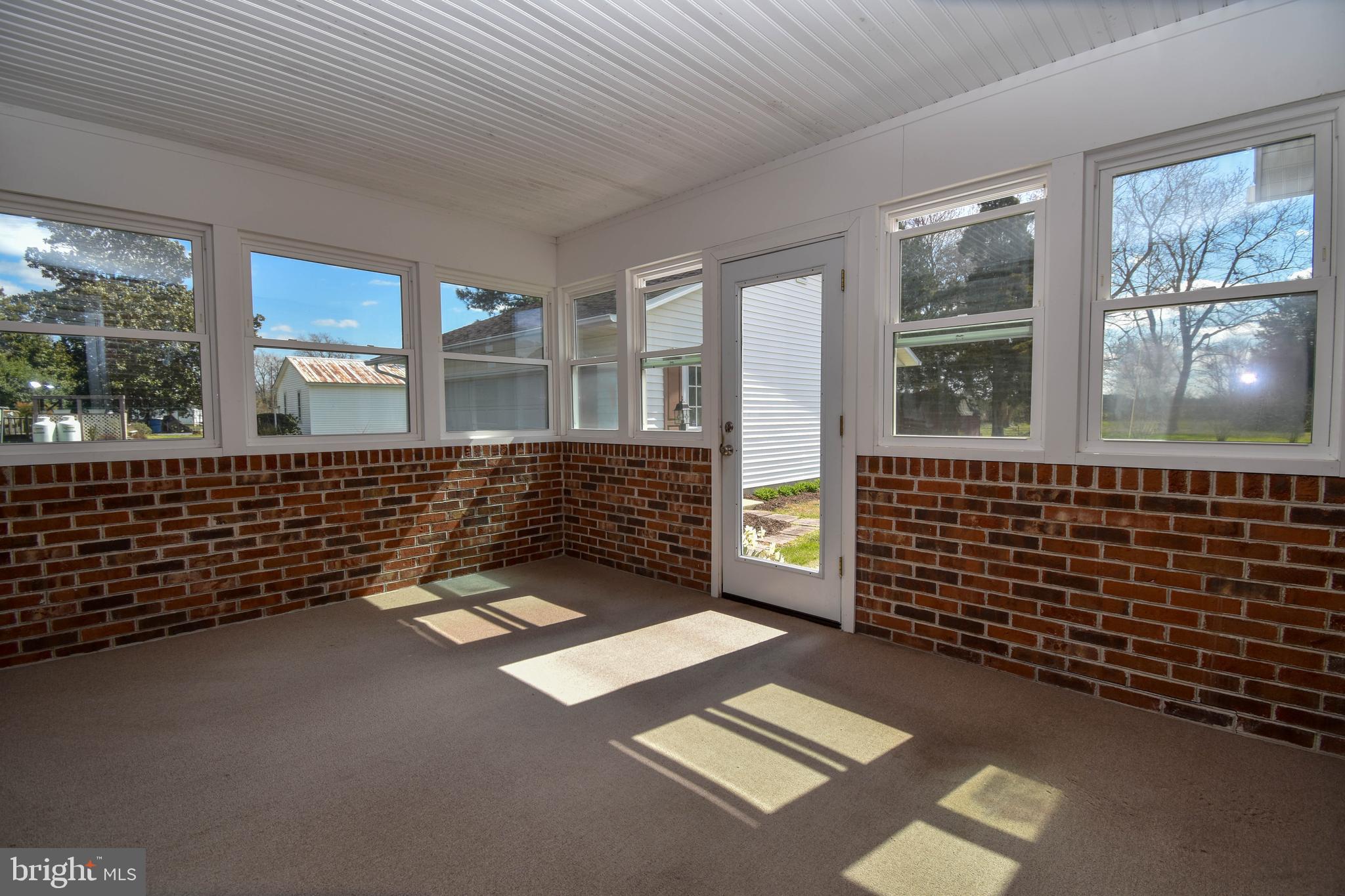 20 Lighthouse Road Selbyville, DE 19975 - Photo 30 of 35 Enclosed Porch