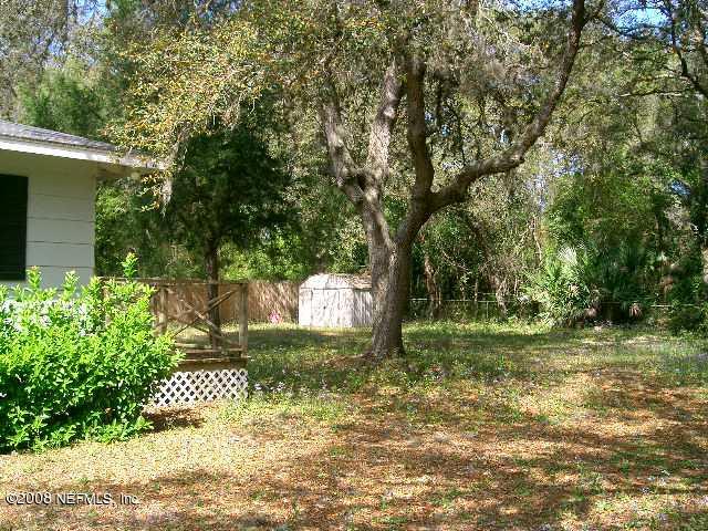 144 Katnack Road St. Augustine, FL 32095 - Photo 2 of 7 a view of a garden