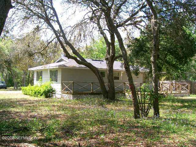 144 Katnack Road St. Augustine, FL 32095 - Photo 3 of 7 a view of a house with a yard