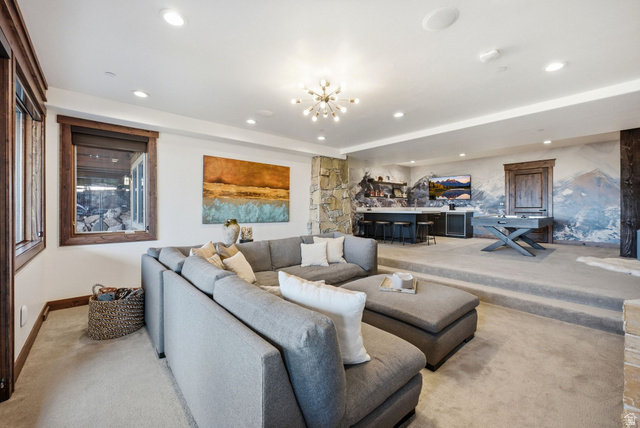 7885 North Rabbitbrush Court, Unit 13 Park City, UT 84098 - Photo 38 of 88 Spacious entertainment area featuring carpeted flooring and recessed lighting