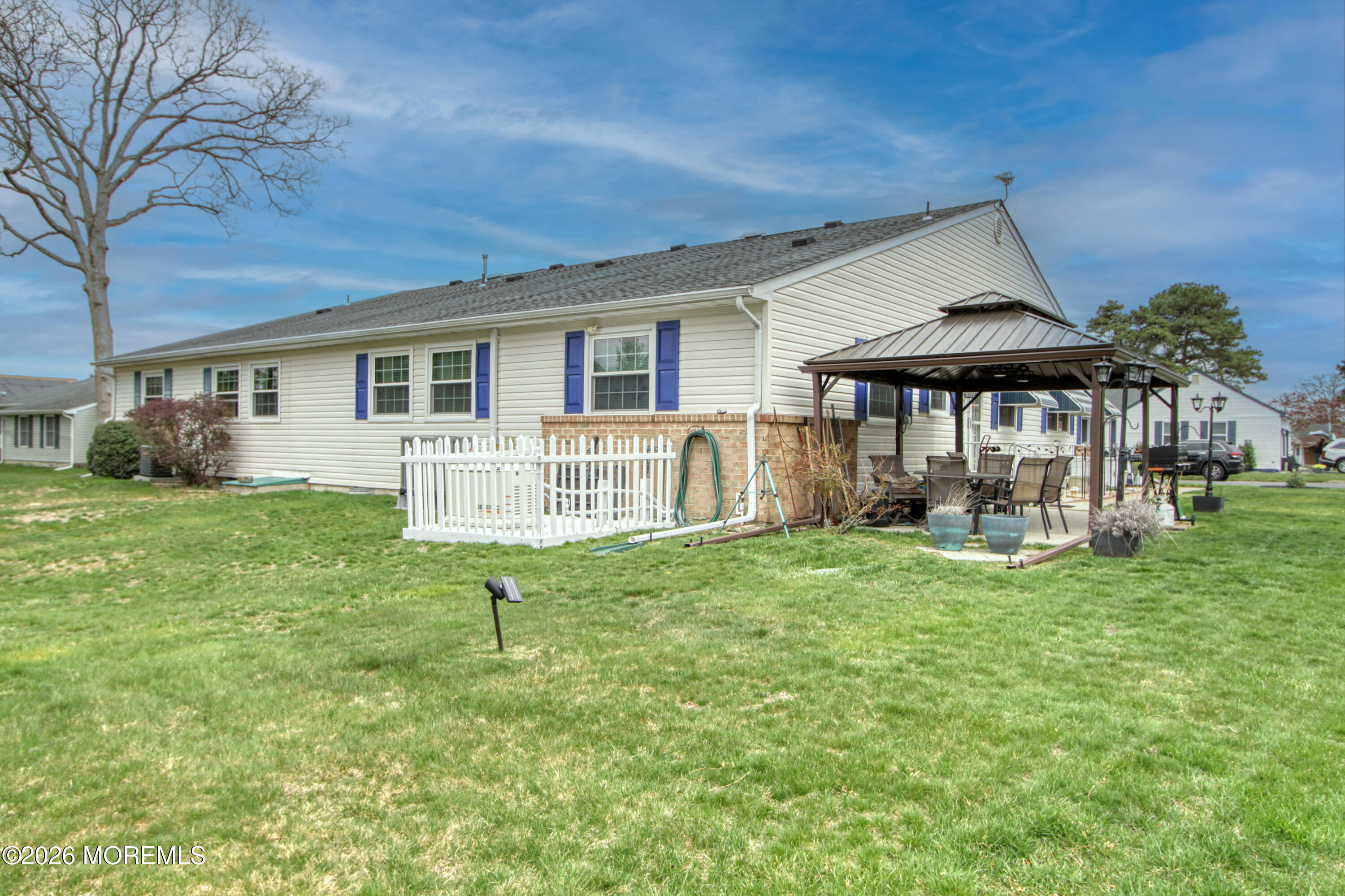 2B Amherst Road, Unit A Whiting, NJ 08759 - Photo 15 of 16 a front view of a house with a yard