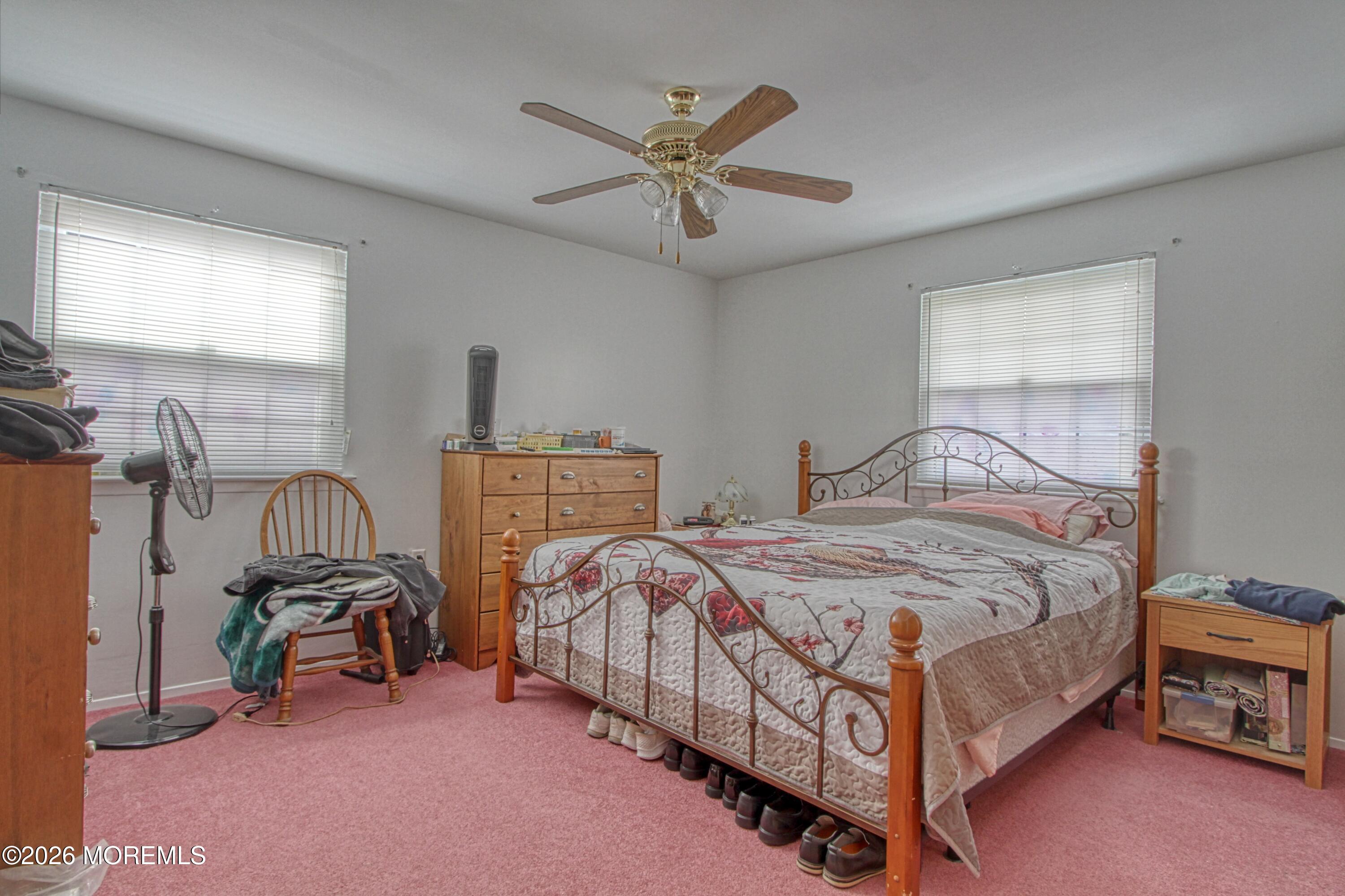 2B Amherst Road, Unit A Whiting, NJ 08759 - Photo 7 of 16 a bedroom with bed and a window
