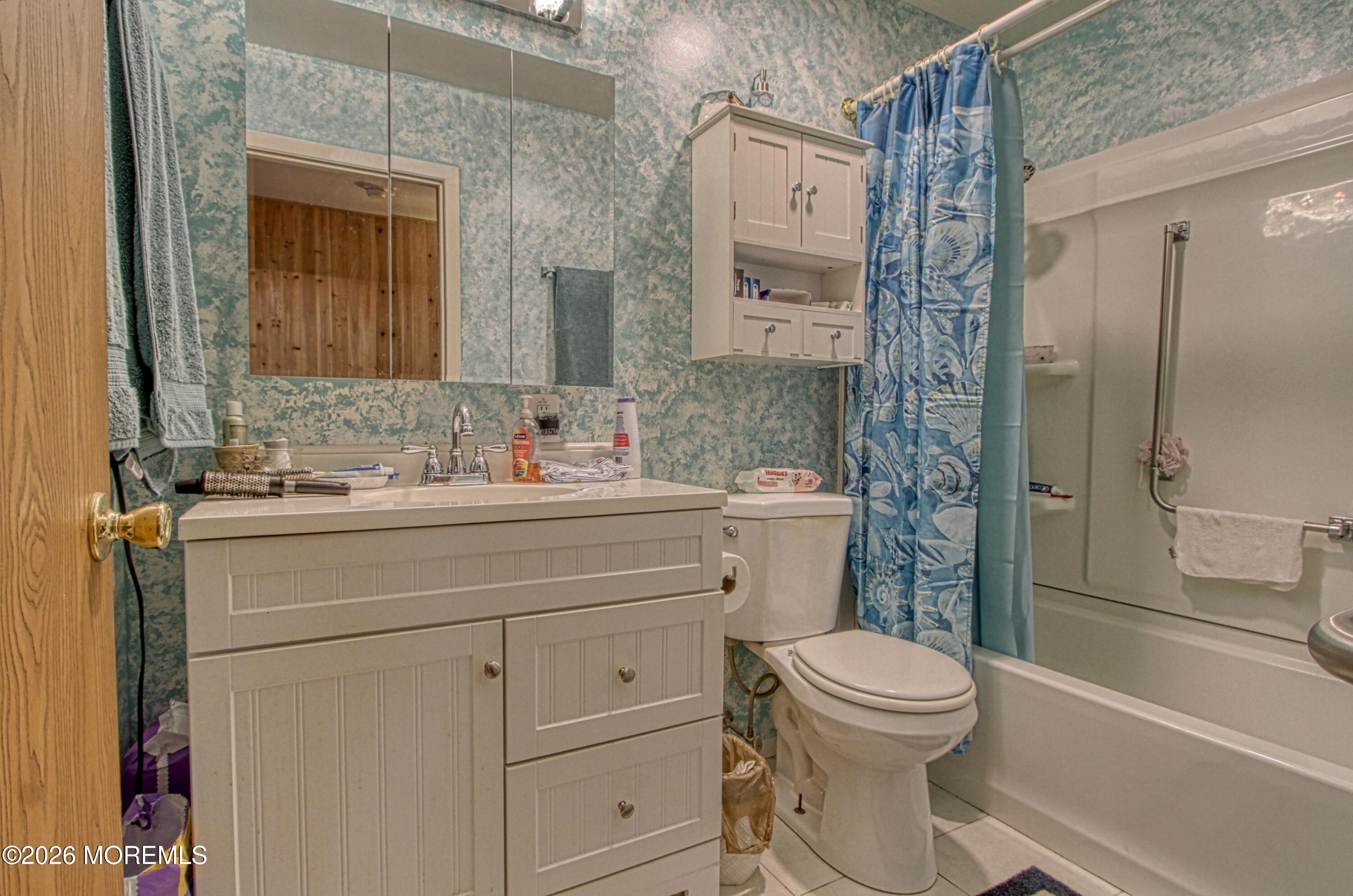 2B Amherst Road, Unit A Whiting, NJ 08759 - Photo 10 of 16 a bathroom with a sink toilet vanity and shower