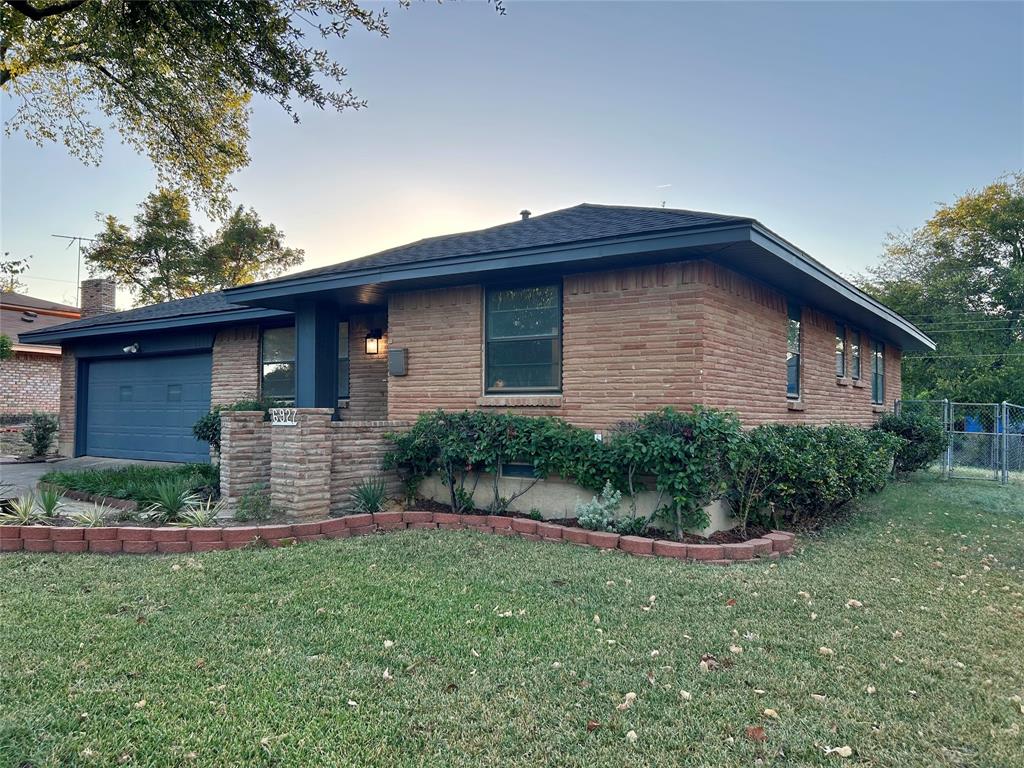 6927 Clearglen Drive Dallas, TX 75232 - Photo 1 of 1 a front view of a house with a yard