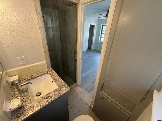 view of bathroom with sink and mirror