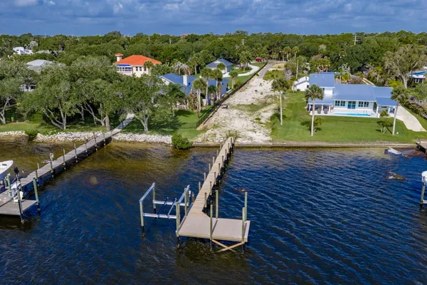 an aerial view of a house with a garden