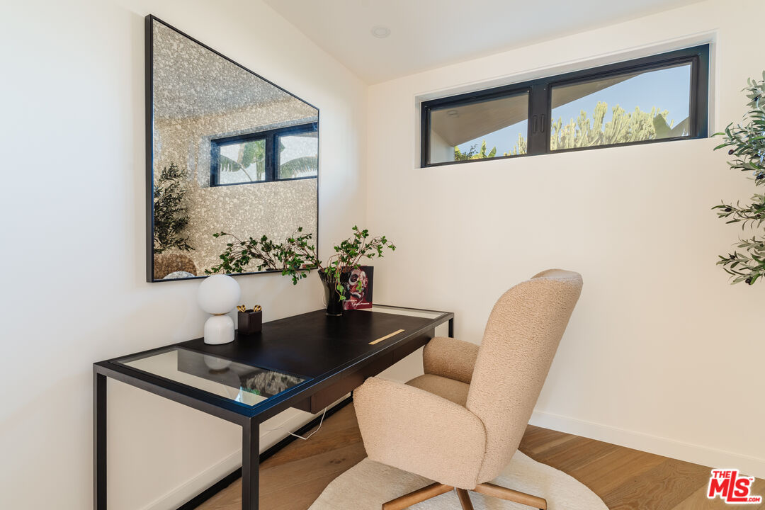 726 Howard Street Marina del Rey, CA 90292 - Photo 21 of 47 a view of a dining room with furniture and wooden floor