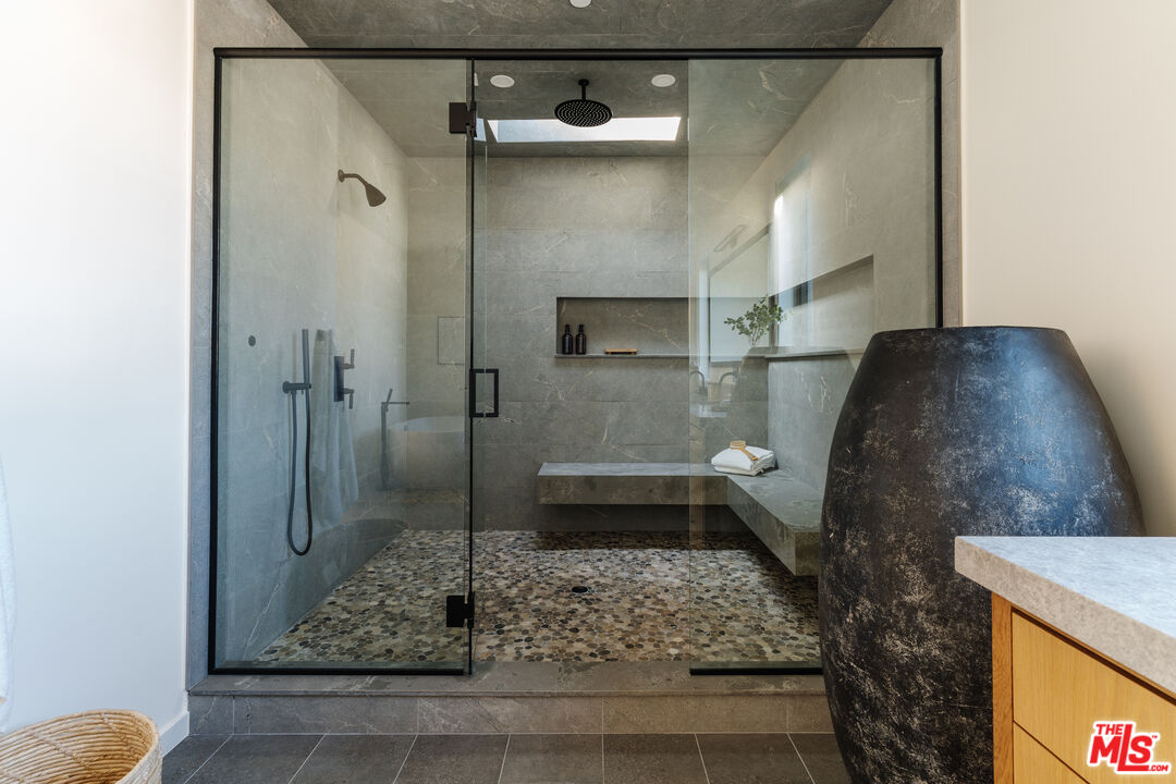 726 Howard Street Marina del Rey, CA 90292 - Photo 34 of 47 a bathroom with a shower and mirror