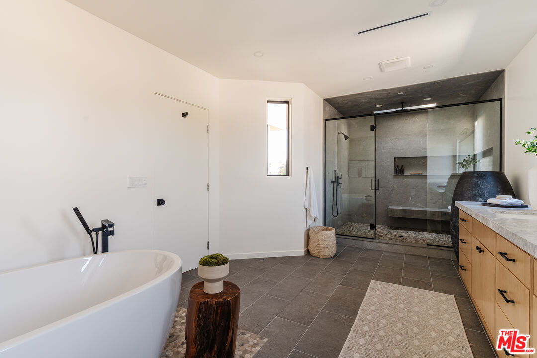 726 Howard Street Marina del Rey, CA 90292 - Photo 36 of 47 a bathroom with a bathtub and a shower