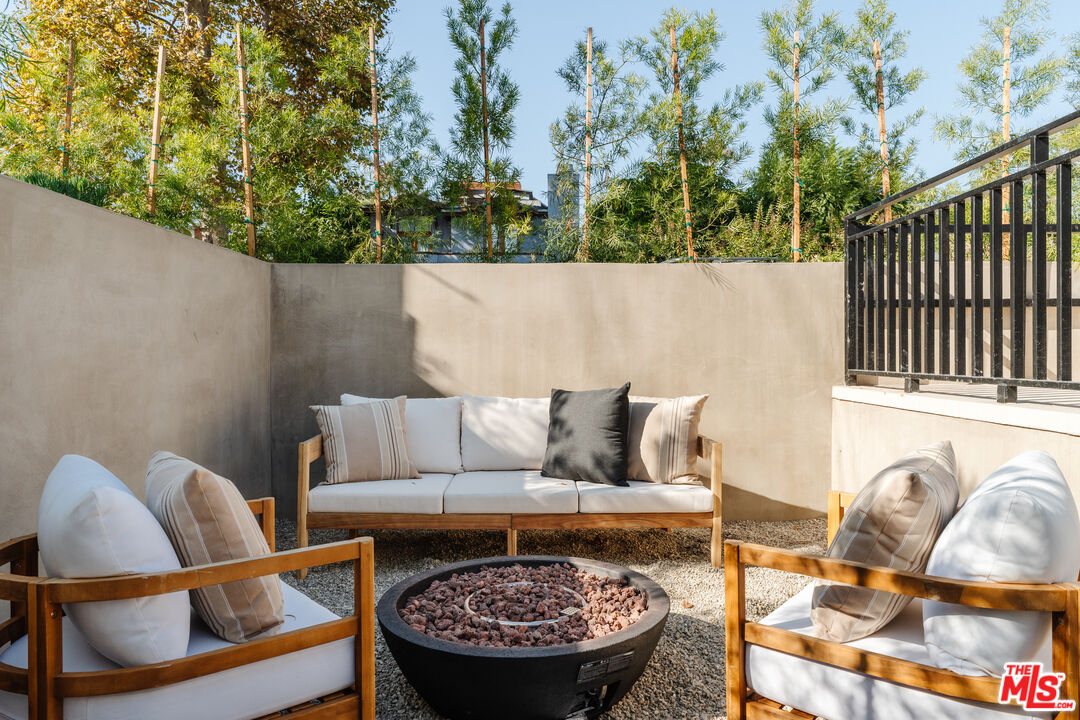 726 Howard Street Marina del Rey, CA 90292 - Photo 45 of 47 swimming pool with a couch and wooden fence