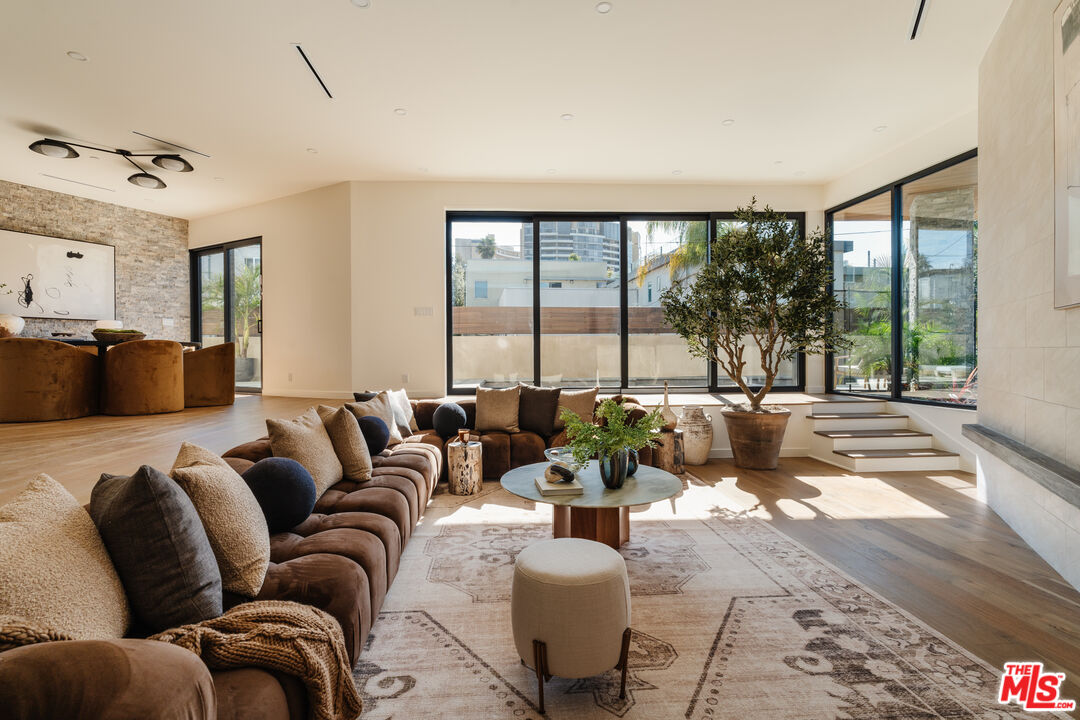 726 Howard Street Marina del Rey, CA 90292 - Photo 8 of 47 a living room with furniture and a large window