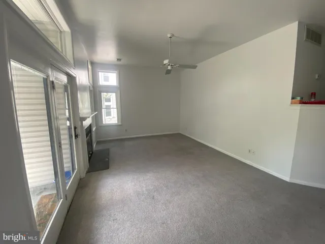 an empty room with windows