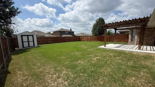 a view of a porch with a yard