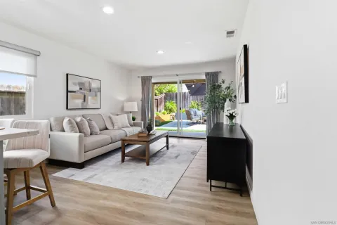 a living room with furniture and window