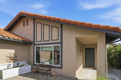 a front view of a house with a windows