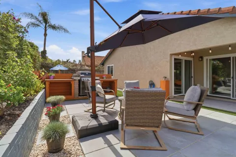 a view of a terrace with furniture